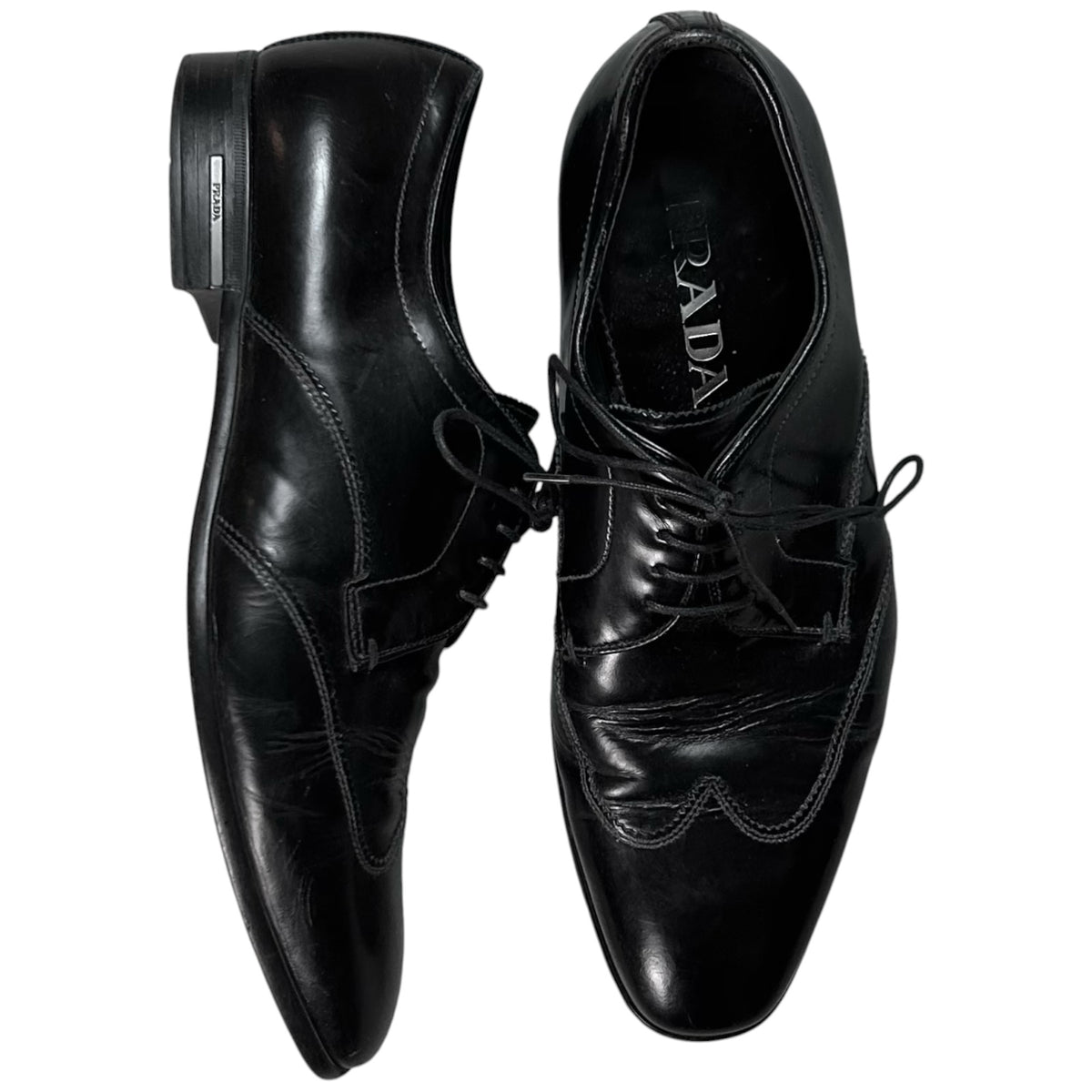 Prada Metal Logo Heel Derbies