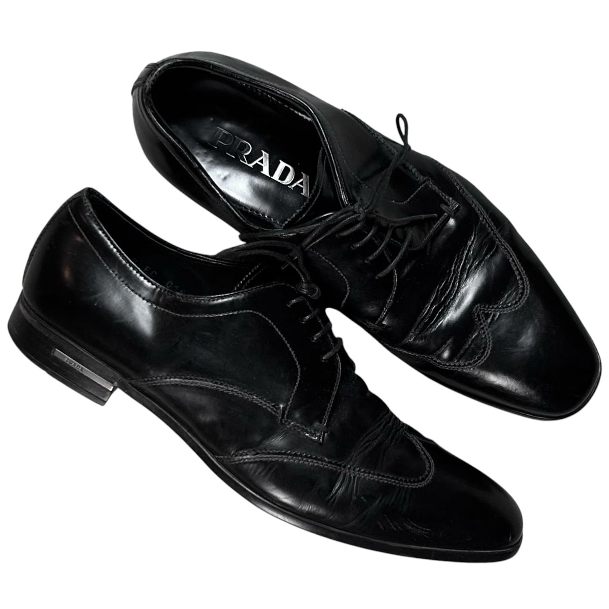Prada Metal Logo Heel Derbies