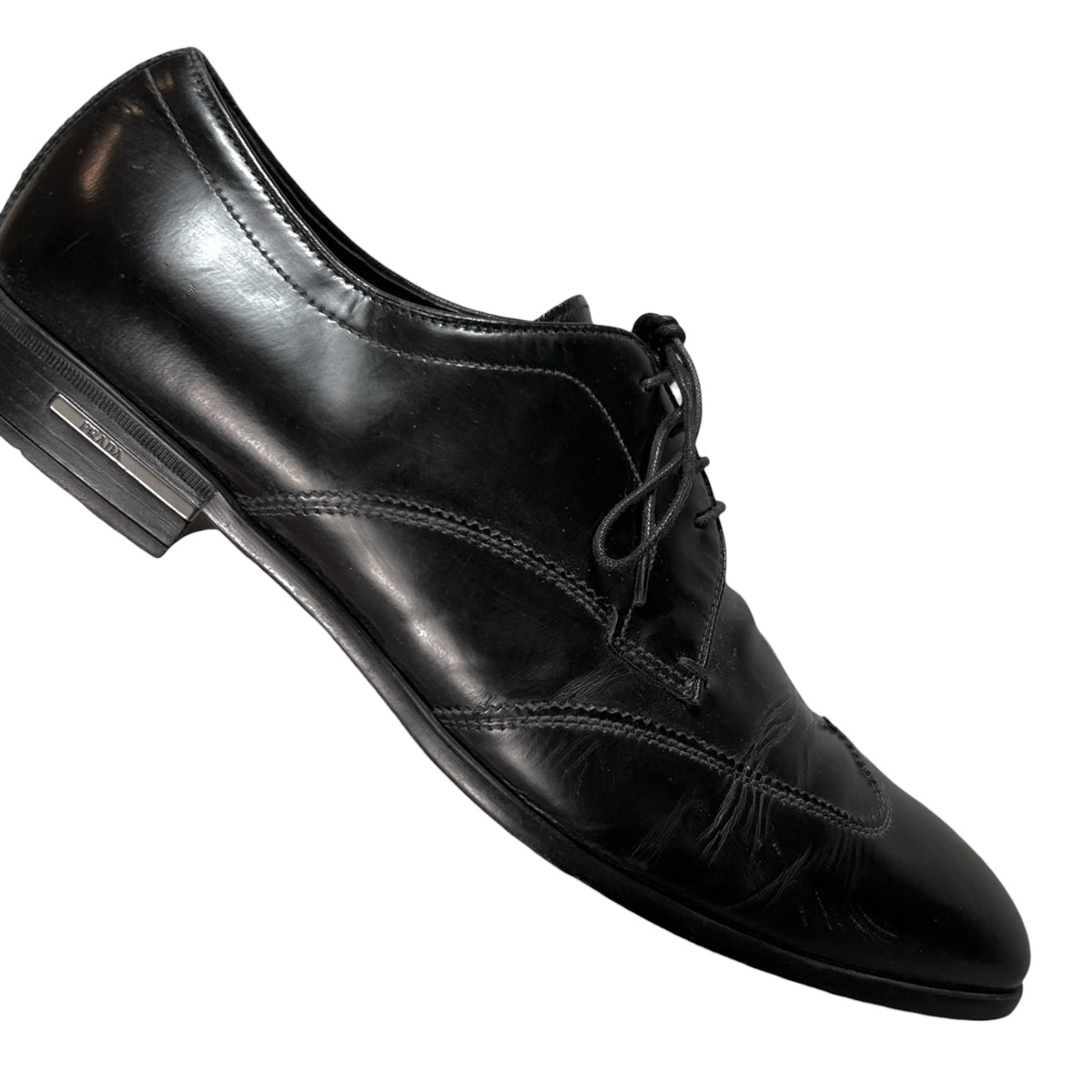 Prada Metal Logo Heel Derbies