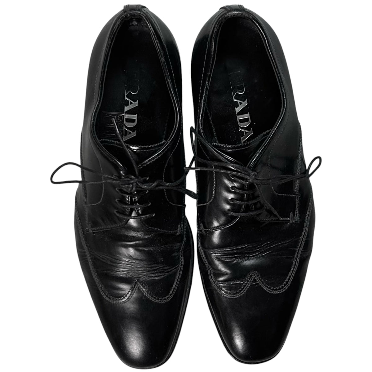 Prada Metal Logo Heel Derbies